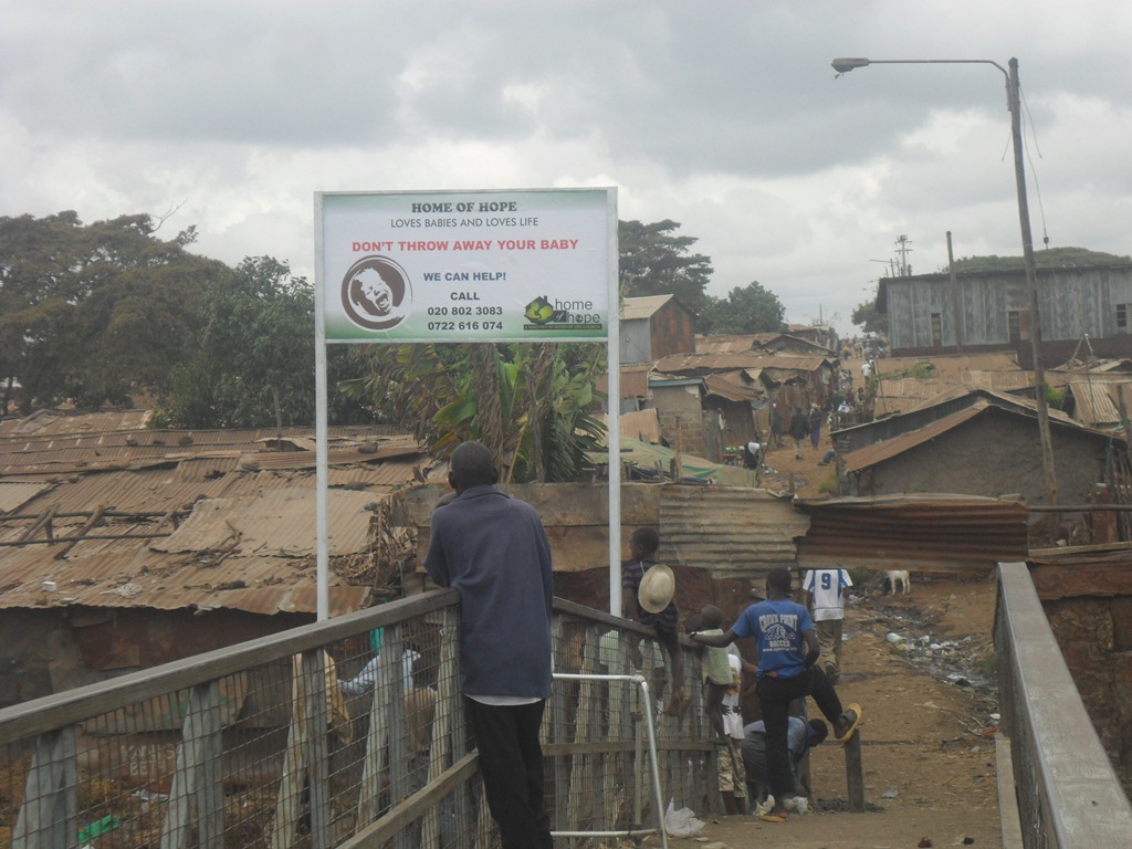 dump sign don't throw away your baby kenya change of perspective