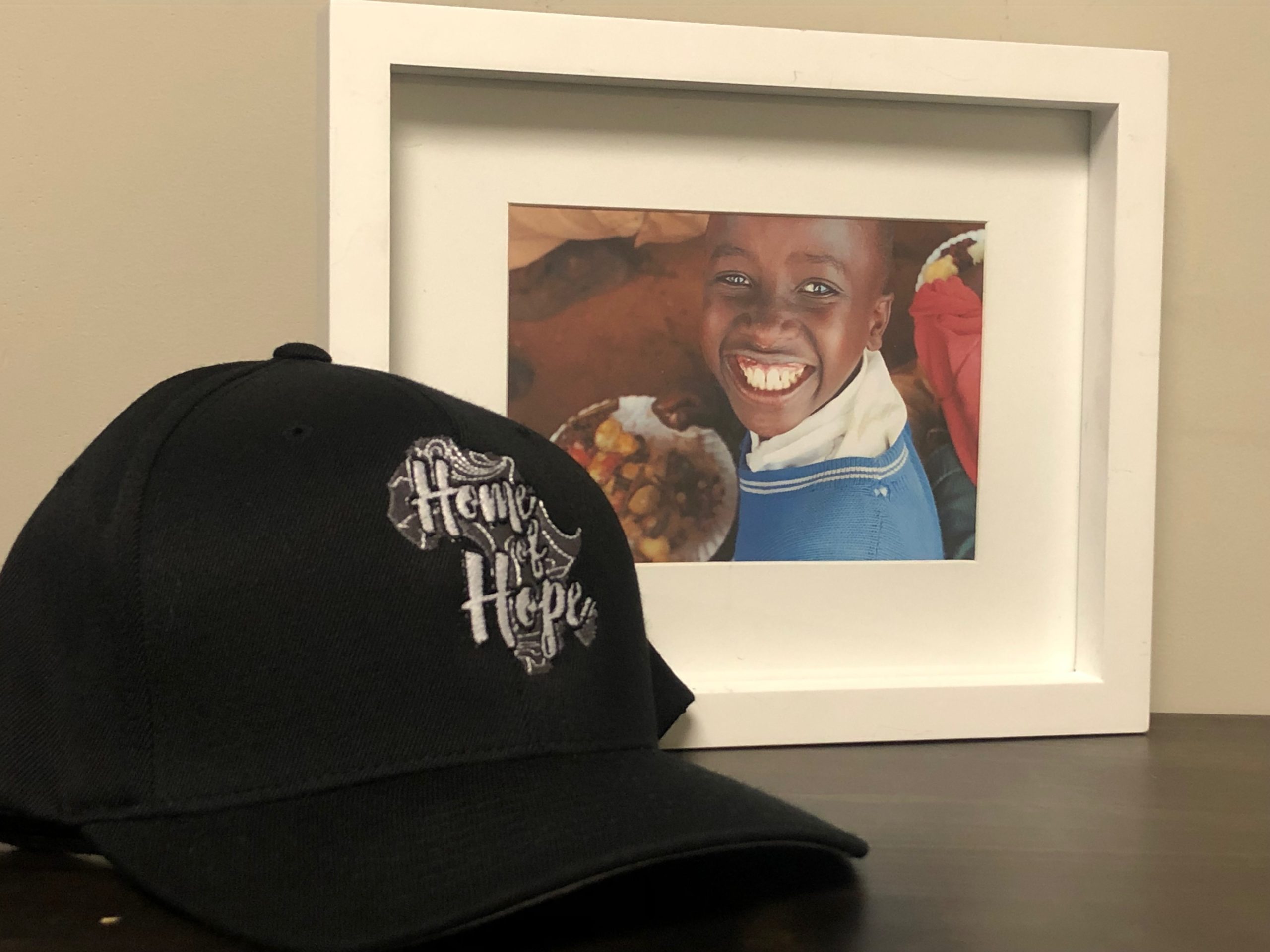 homeofhope home of hope hat black logo merch product merchandise donate donation sponsor sponsorship help donations child health cards healthcard feeding program