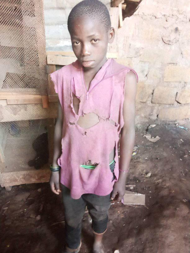 Congo street kid in rags